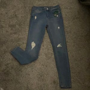 High rise blue wash skinny jeans